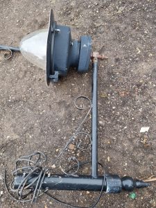 Old SUGGs street light fitted to ornate post top bracket from Fenori heritage lighting